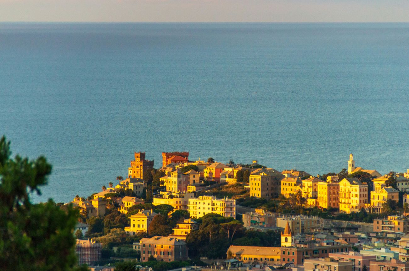 Mediterranean coastal town bathed in golden hour light